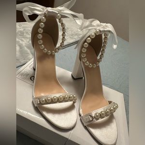 Shiny white pearl heels